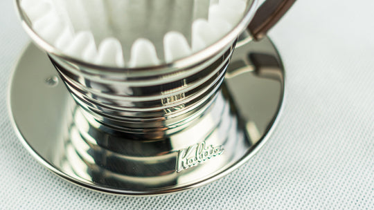 Close up of a kalita wave coffee dripper with filter inside